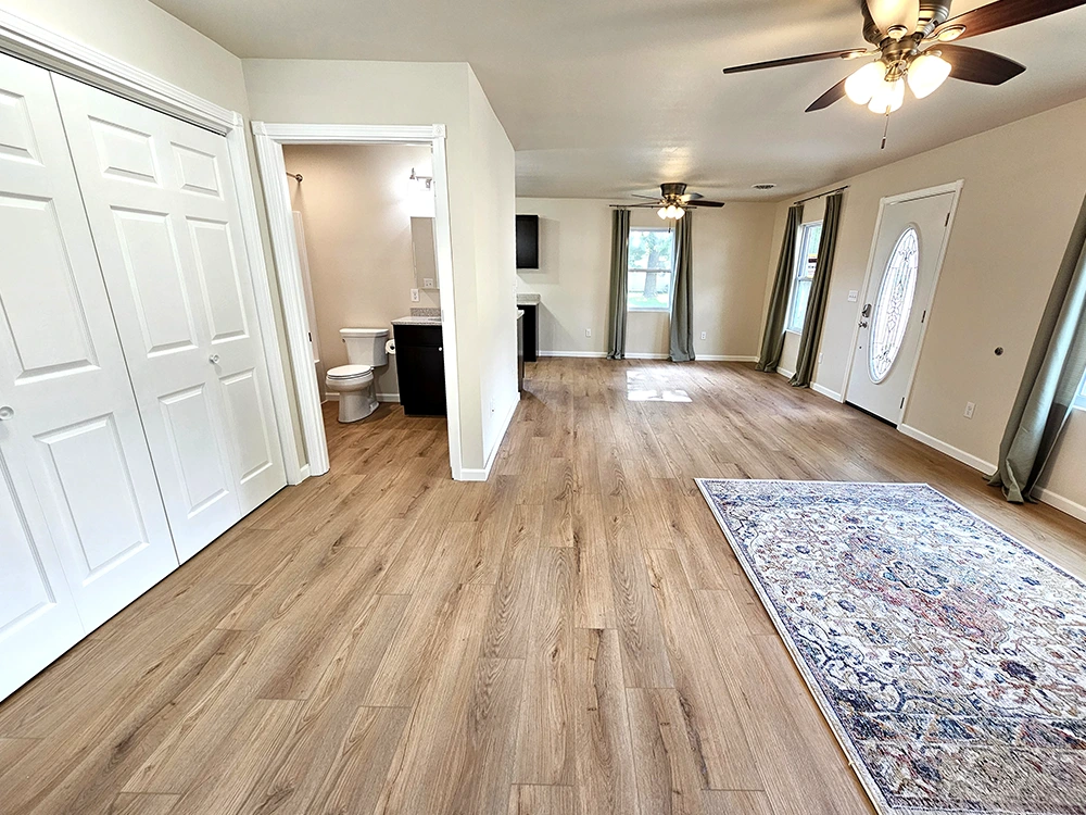 Spacious, yet Cozy, Open Concept - Main Living Room and Dining Room Areas - Large Picture Window lets the natural light in.