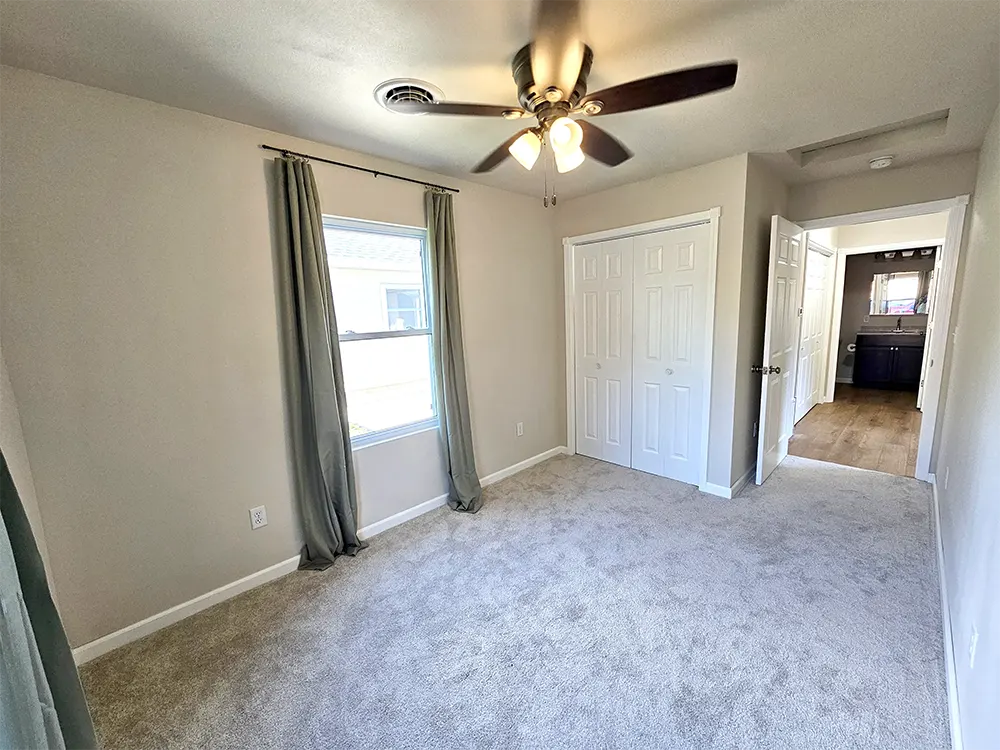 Includes a lighted closet with extra storage - perfect for a second bedroom, hobby room, or home office.